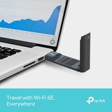 محول USB لاسلكي عالي الكسب من نوع TP-Link TXE70UH AXE5400 بتقنية WiFi 6E