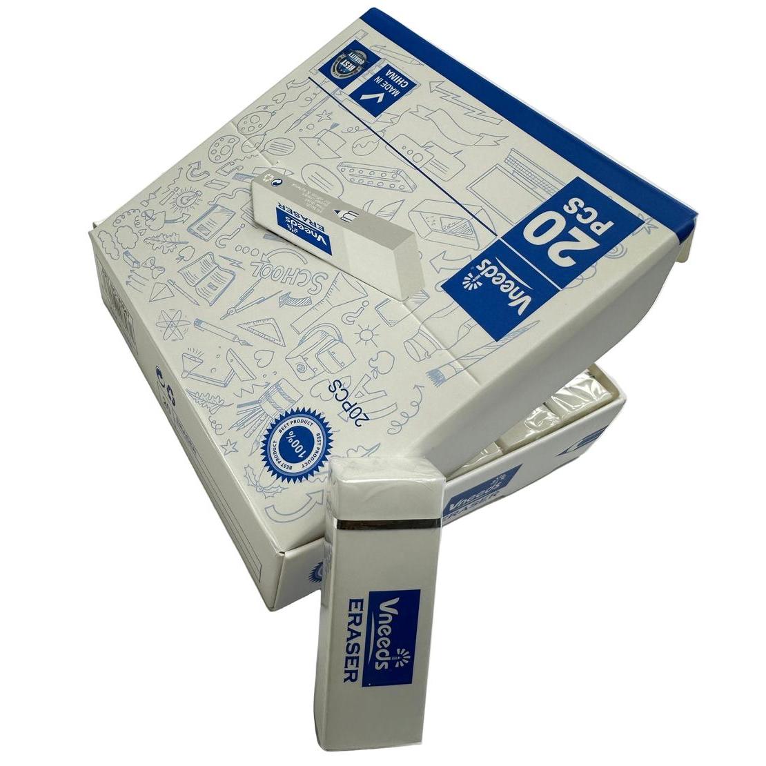 White eraser with blue label on a white surface